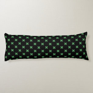 Green cross stitches on black body cushion
