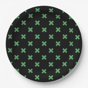 Green cross stitches on black paper plate