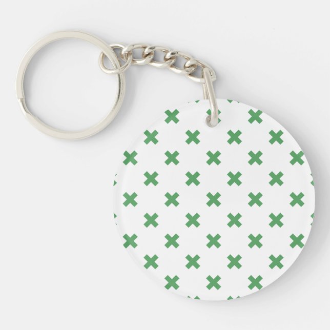 Green cross stitches on white key ring (Front)