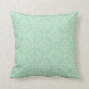 Green damask pattern cushion