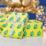 Green Dreidel on Yellow Hanukkah Wrapping Paper<br><div class="desc">Green Dreidel on Yellow Hanukkah Wrapping Paper</div>