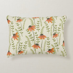 Green ferns, orange flowers, nature. decorative cushion