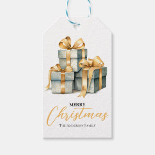 Green gift boxes with gold ribbon gift tag