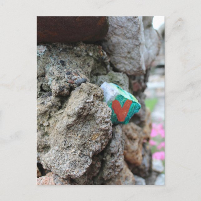Green Gold Heart Painted Heart Rock on Rock Wall  Postcard (Front)
