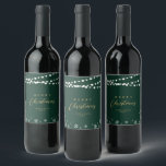 Green & Gold String Lights Snow Merry Christmas Wine Label<br><div class="desc">Celebrate the season with this stylish custom Christmas wine label. This label design features "Merry Christmas" text and a festive snowflake and string lights background. You can personalise the text. More holiday stationery and party supplies are available at my shop BaraBomDesign.</div>