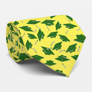 Green Graduation Caps Tossed in the Air on Yellow Tie