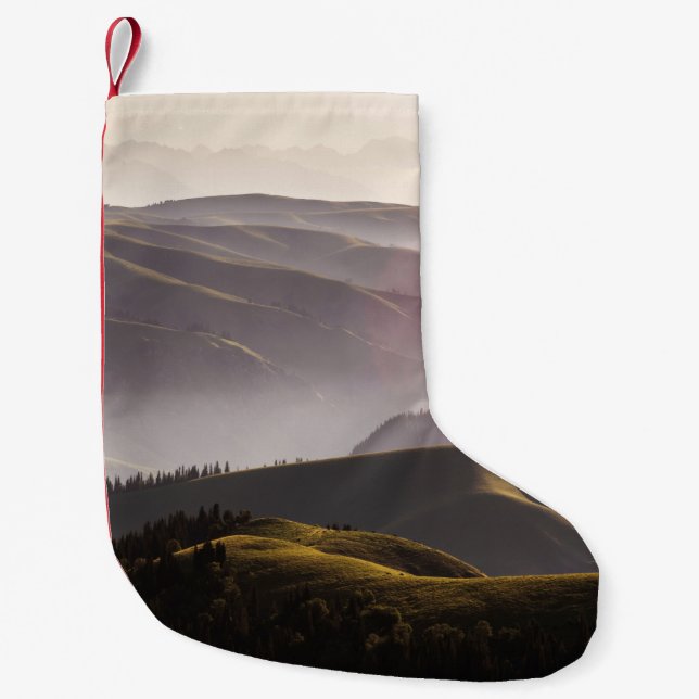 GREEN GRASS FIELD AND MOUNTAINS DURING DAYTIME SMALL CHRISTMAS STOCKING (Front)