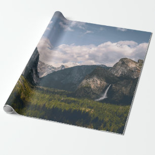 GREEN GRASS FIELD NEAR ROCKY MOUNTAIN UNDER WHITE  WRAPPING PAPER