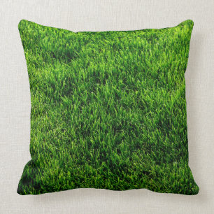 Green grass texture from a soccer field cushion