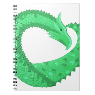 Green heart dragon on white notebook