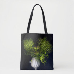 Green heart in black tote bag