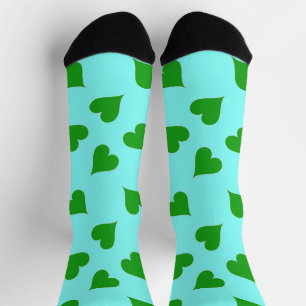 Green hearts pattern on blue socks