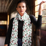 Green Holly Leaves Red Berries Christmas Holiday Scarf<br><div class="desc">This chiffon scarf features a festive design perfect for the Christmas holidays. The pattern consists of green holly leaves and bright red berries on a white background, creating a classic and elegant holiday look. The delicate and lightweight chiffon fabric adds a touch of sophistication, making it a versatile accessory that...</div>