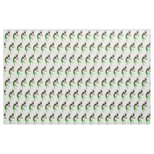 green kokopelli on white fabric