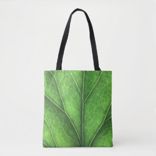 Green leaf on a market tote bag