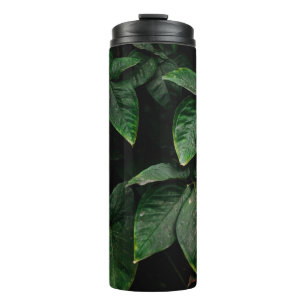 GREEN-LEAFED PLANT ON FOCUS PHOTOGRAPHY THERMAL TUMBLER