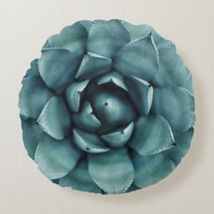 Green leafed plant round cushion