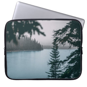 GREEN-LEAFED TREE NEAR BODY OF WATER LAPTOP SLEEVE