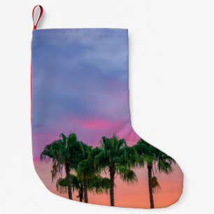 Green leaves tree under blue sky during golden hou small christmas stocking