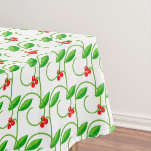 Green Leaves with Little Red Wild Berries on White Tablecloth
