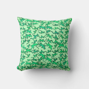 Green lizards on a lime green background cushion