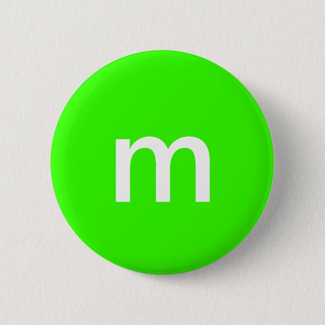 Green m&m 6 cm round badge (Front)