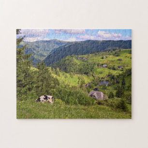 Green Meadows and a cow with panorama view Jigsaw Puzzle