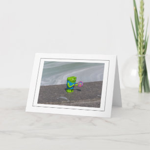 Green monster plastic toy view greeting card