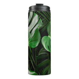 Green monstera leaves and palm leaves thermal tumbler