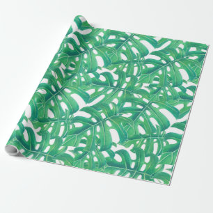Green monstera tropical leaves pattern  on white b wrapping paper