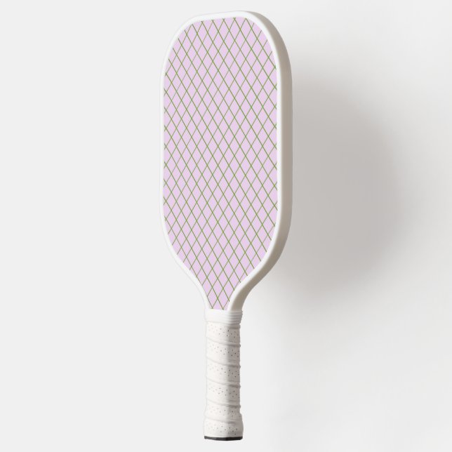 Green net mesh on pink pickleball paddle (Left)