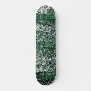 Green oil texture upon sticks and lint skateboard