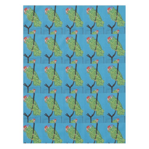 green parrots on blue tablecloth