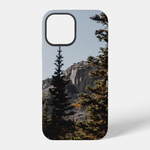 GREEN PINE TREES NEAR MOUNTAIN DURING DAYTIME iPhone 12 CASE