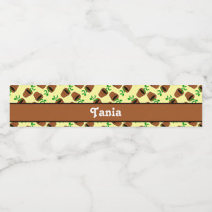 Green plant in terracotta pot on yellow water bottle label