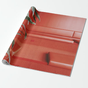 Green plant on red couch wrapping paper