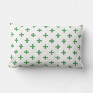 Green polka crosses on white lumbar cushion