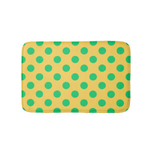 Green polka dots on yellow bath mat