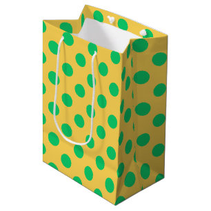 Green polka dots on yellow medium gift bag