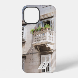 GREEN POTTED PLANT ON BROWN CONCRETE HOUSE BALCONY iPhone 12 CASE