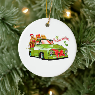 Green retro truck with gifts and dogb ceramic tree decoration