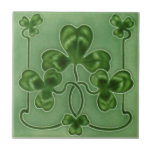 Green Shamrocks Irish Art Nouveau Repro Design Tile<br><div class="desc">This is a lovely soft green art nouveau shamrock themed tile reproduced from the antique original. The perfect way to wish someone luck, celebrate St. Patrick's Day (when everyone is Irish!) or use as a wall or backsplash tile for kitchen, bath, shower or laundry, a fireplace surround, desk accessories, or...</div>