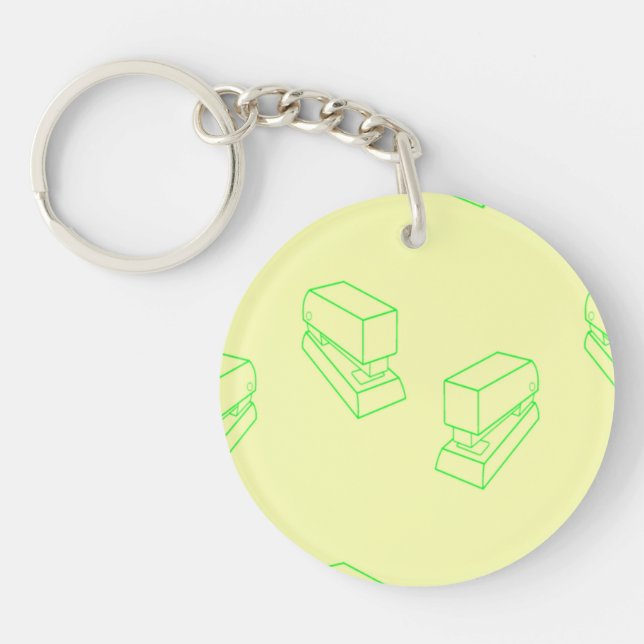 Green stapler on yellow key ring (Front)