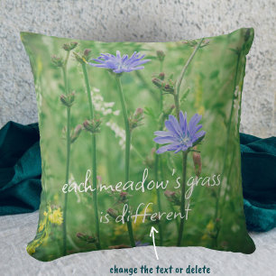 Green summer meadow with blue flowers cushion