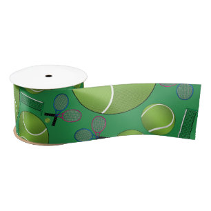 Green tennis balls rackets and nets satin ribbon