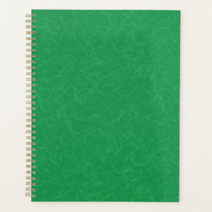Green textured surface with swirling pattern planner
