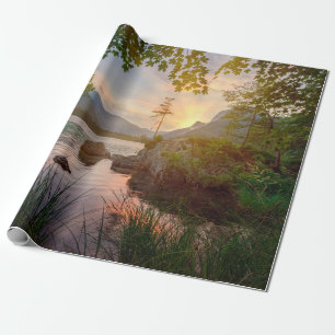 GREEN TREES NEAR BODY OF WATER DURING DAYTIME WRAPPING PAPER