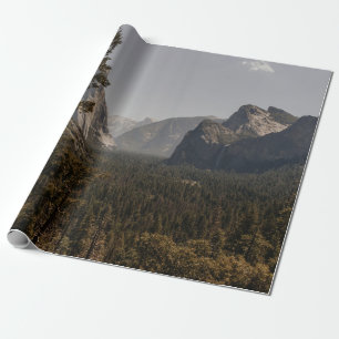 GREEN TREES NEAR MOUNTAIN DURING DAYTIME WRAPPING PAPER