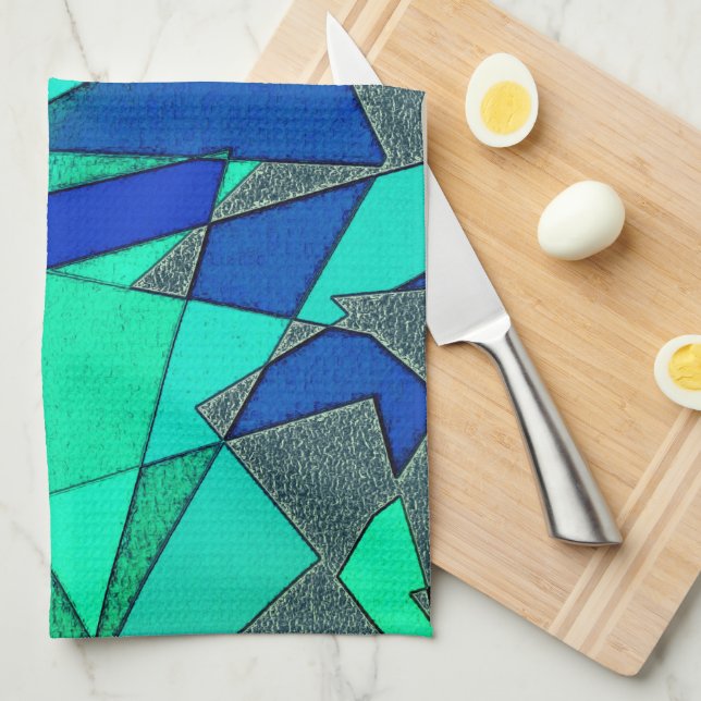 Green triangular cutouts on blue background, rough tea towel (Quarter Fold)
