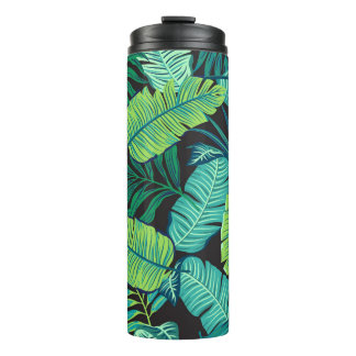Green tropical leaves: vintage pattern. thermal tumbler